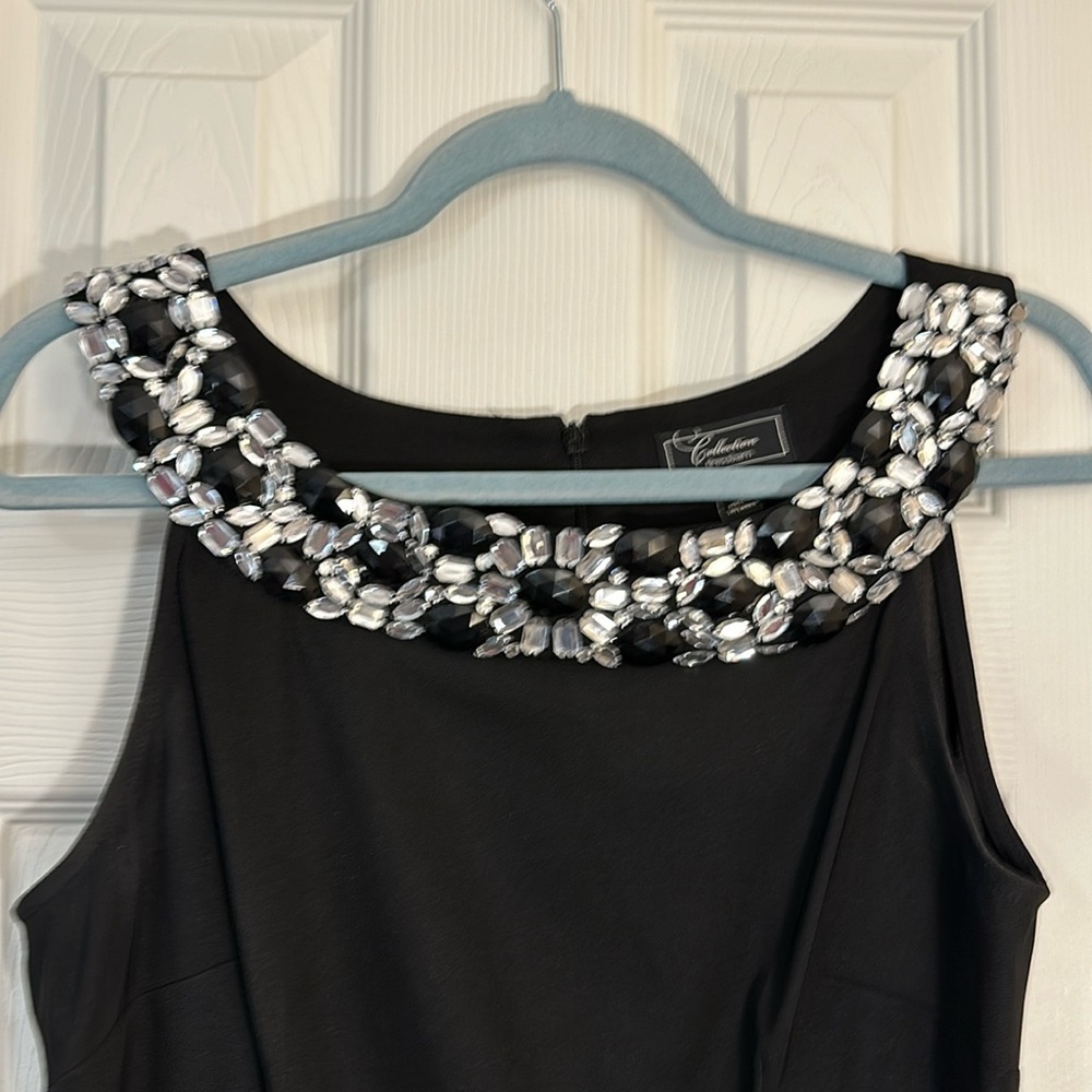 Dress barn black cocktail dress. With beaded embellishments around neckline.